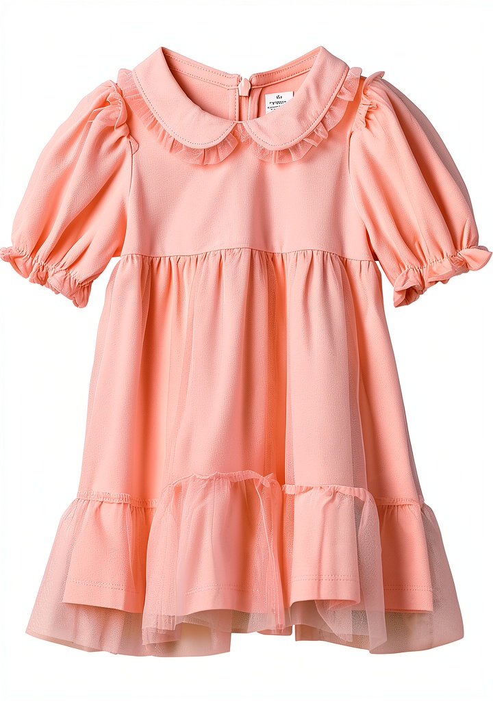Baby girl wearing Amazon Essentials dress in Light Pink at a birthday party
